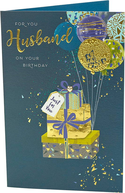 Contemporary UK Greetings birthday greeting card for husband featuring colorful balloons and modern design.
