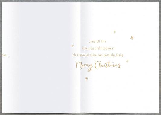 3D Crescent Moon Christmas greeting card featuring a couple design from UK Greetings with festive holiday imagery.
