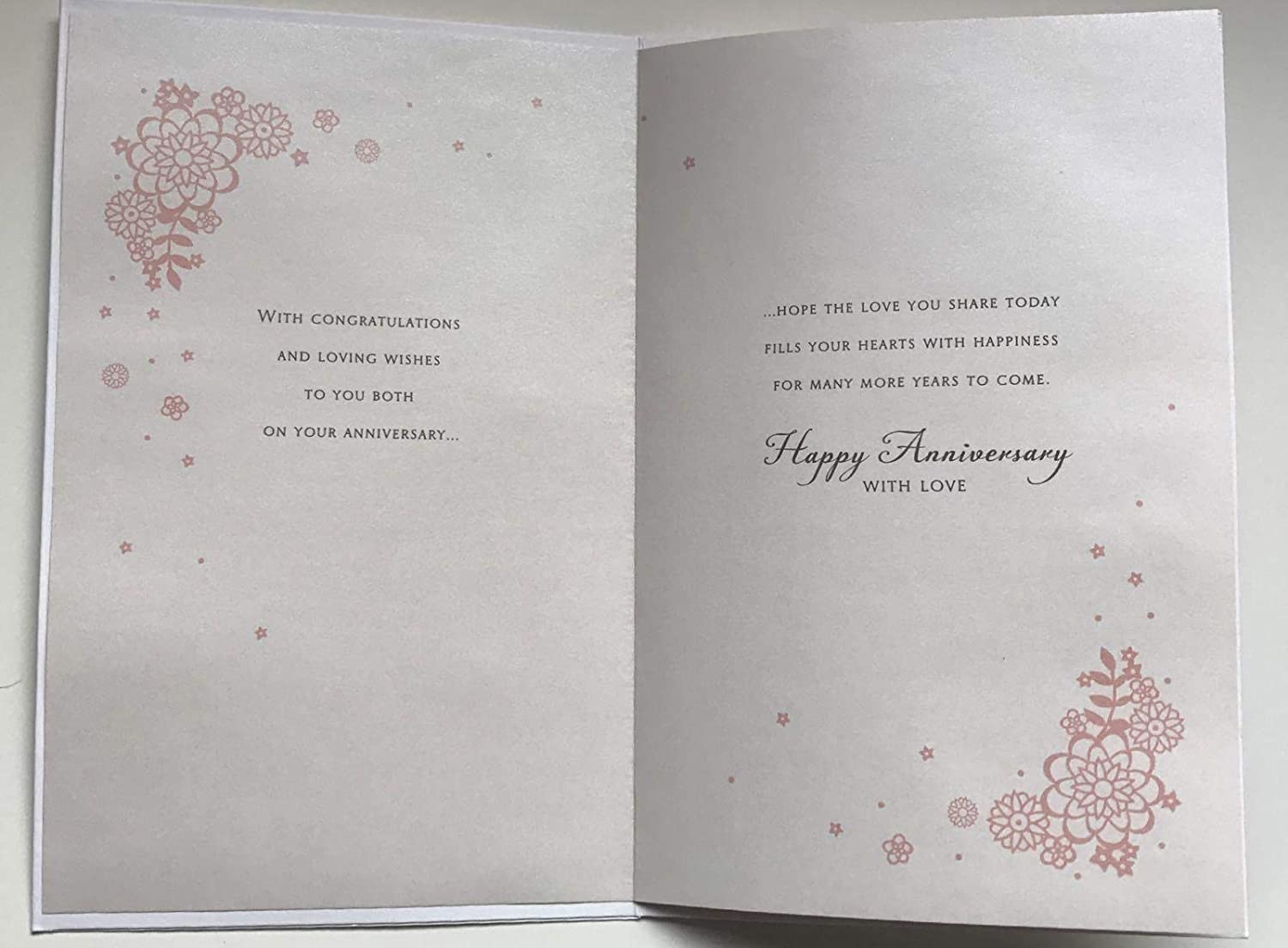 Elegant die-cut pearls anniversary greeting card featuring a special couple design, from UK Greetings, with luxurious details.
