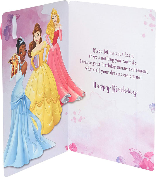 Disney Princess birthday greeting card featuring Belle, Aurora, and Tiana from UK Greetings with colorful princess illustrations.