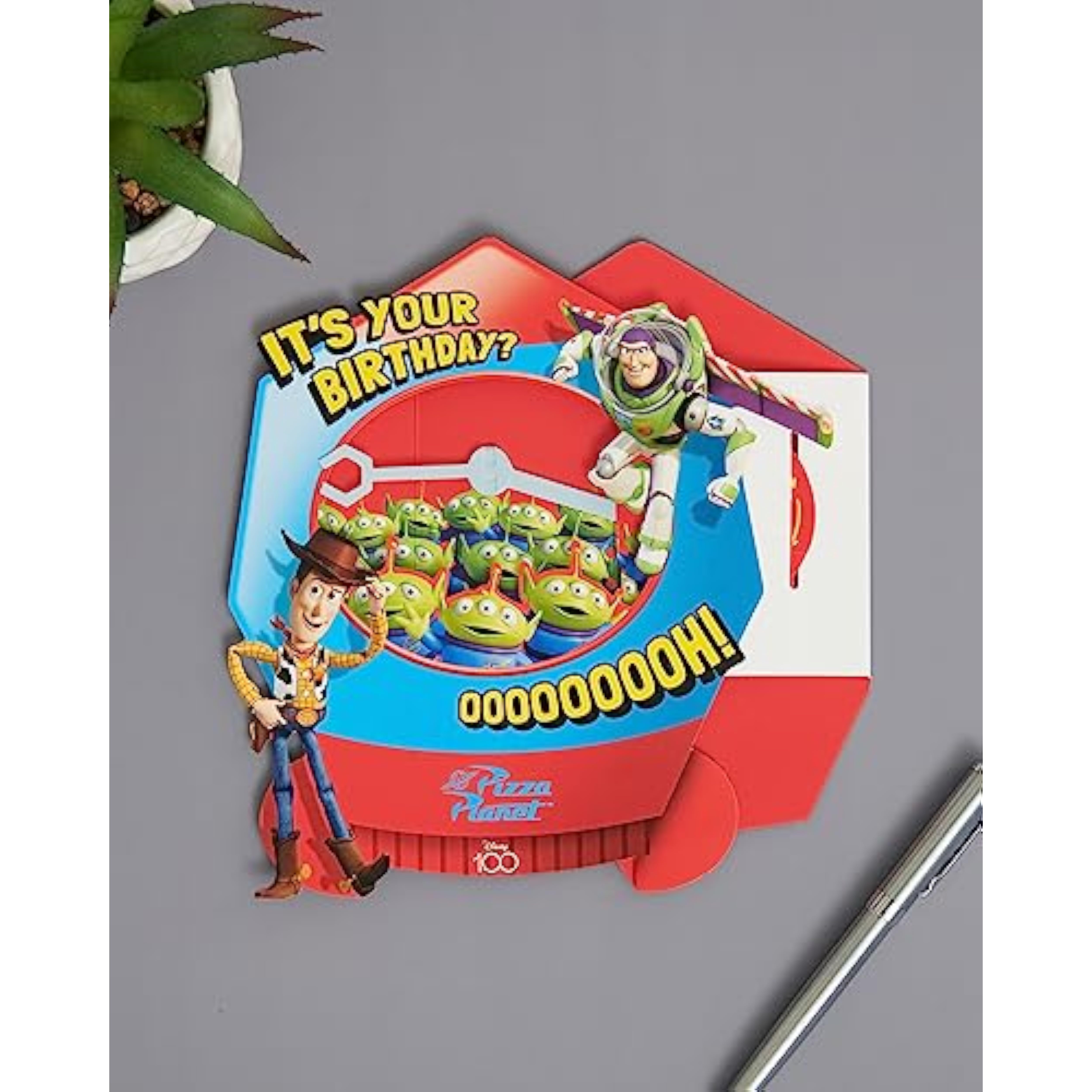 3D Toy Story birthday greeting card with grabber machine design by UK Greetings, featuring colorful Toy Story characters.
