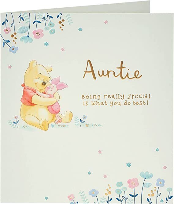 Disney Winnie The Pooh Auntie birthday greeting card from UK Greetings featuring colorful Pooh illustration and festive design.