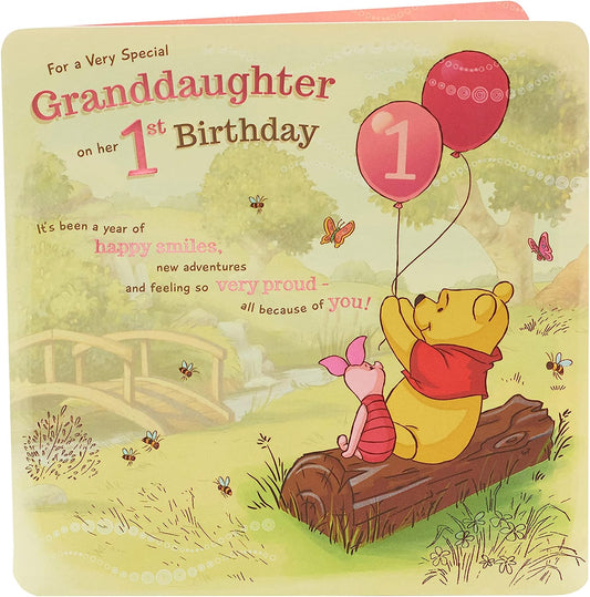 Disney Winnie the Pooh granddaughter 1st birthday greeting card with colorful illustration and heartfelt message from UK Greetings