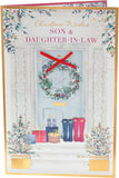 Greeting card featuring a doorway with a festive wreath, designed for sons and daughters-in-law for Christmas by UK Greetings.