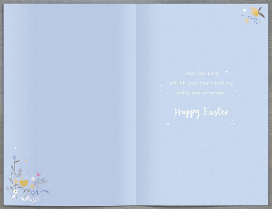 Easter greeting card featuring a silver cross and flowers with religious motifs, designed by UK Greetings for Holy Season celebrations.