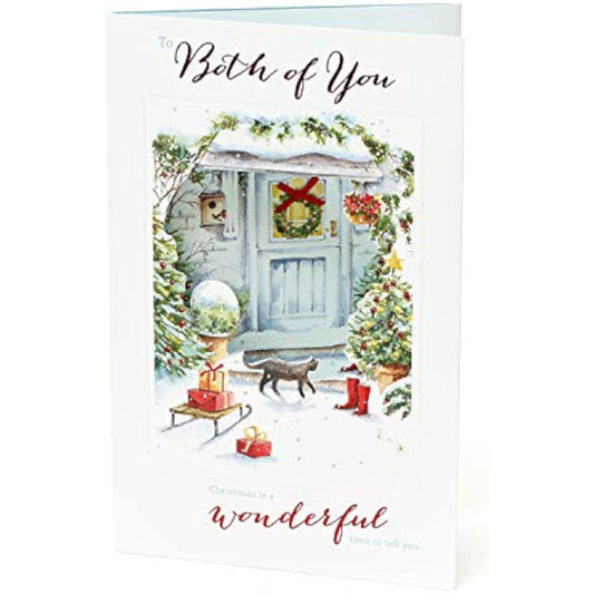 Elegant UK Greetings Christmas greeting card for a couple with glitter accents and a decorative bow, featuring festive holiday design.
