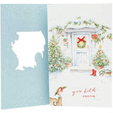 Elegant UK Greetings Christmas greeting card featuring a glitter design and bow for a special couple.