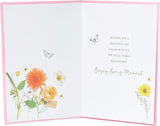 Elegant floral posy birthday greeting card with metallic shine from UK Greetings, featuring colorful flower illustrations.