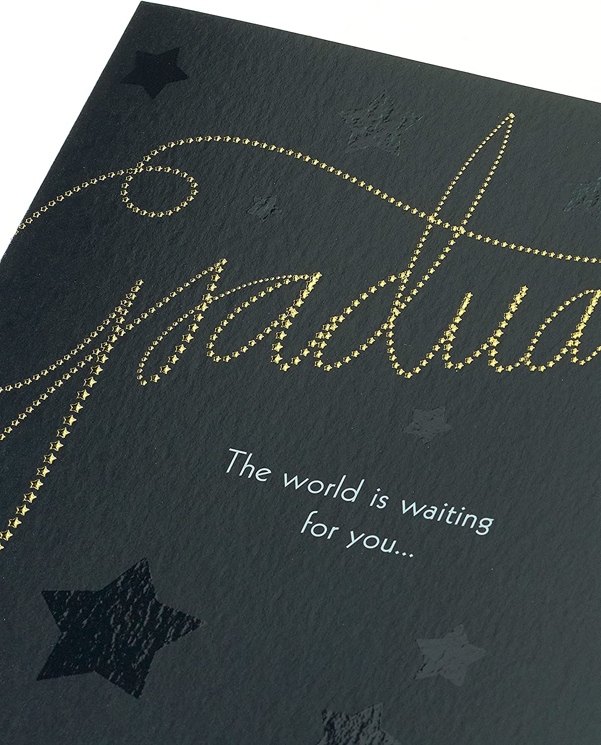 Elegant foil embossed graduation greeting card with gold accents, featuring celebratory design on high-quality UK Greetings card.
