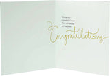 Elegant foil embossed UK Greetings graduation greeting card with a stylish design and celebratory message inside.