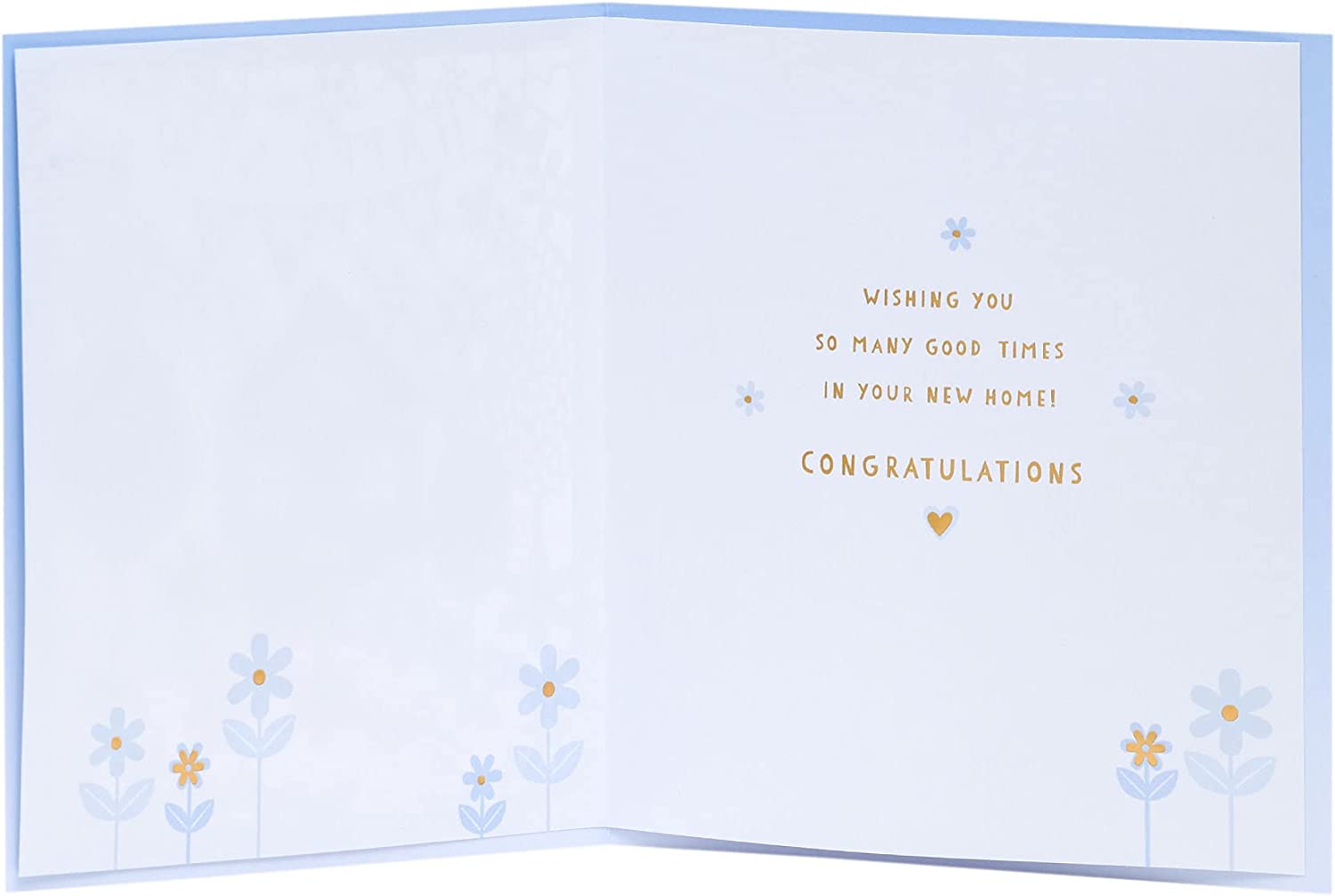 Elegant laser cut new home congratulations greeting card from UK Greetings featuring intricate design and heartfelt message.