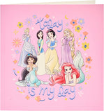Disney Princess-themed greeting card with wrap and tag set, featuring colorful princess illustrations and decorative embellishments.