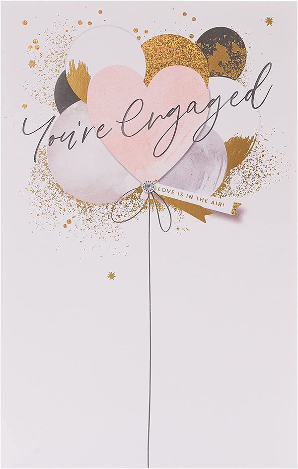 Elegant engagement congratulations greeting card by UK Greetings with floral design and heartfelt message inside.