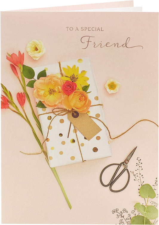 Floral design special friend birthday greeting card with colorful flowers and cheerful message, by UK Greetings.