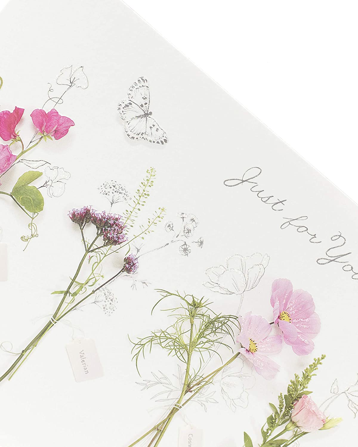 Floral Pretty Birthday Card by UK Greetings featuring meadow flowers and colorful botanical design on a greeting card.