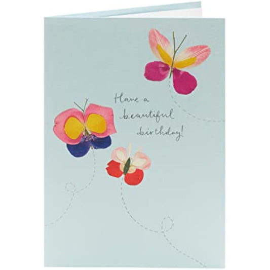 Colorful greeting card featuring flower petal butterflies from the Meadow Range by UK Greetings, perfect for birthdays.