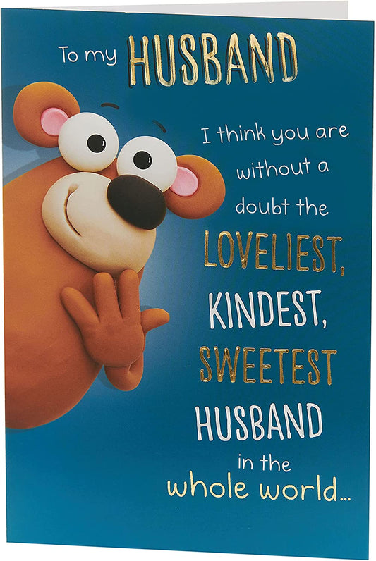 Humorous greeting card for husband's birthday from UK Greetings, featuring funny illustrations and message on front.