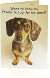 Funny dog-themed greeting card with a 4-letter word design from UK Greetings, featuring playful dog illustrations.