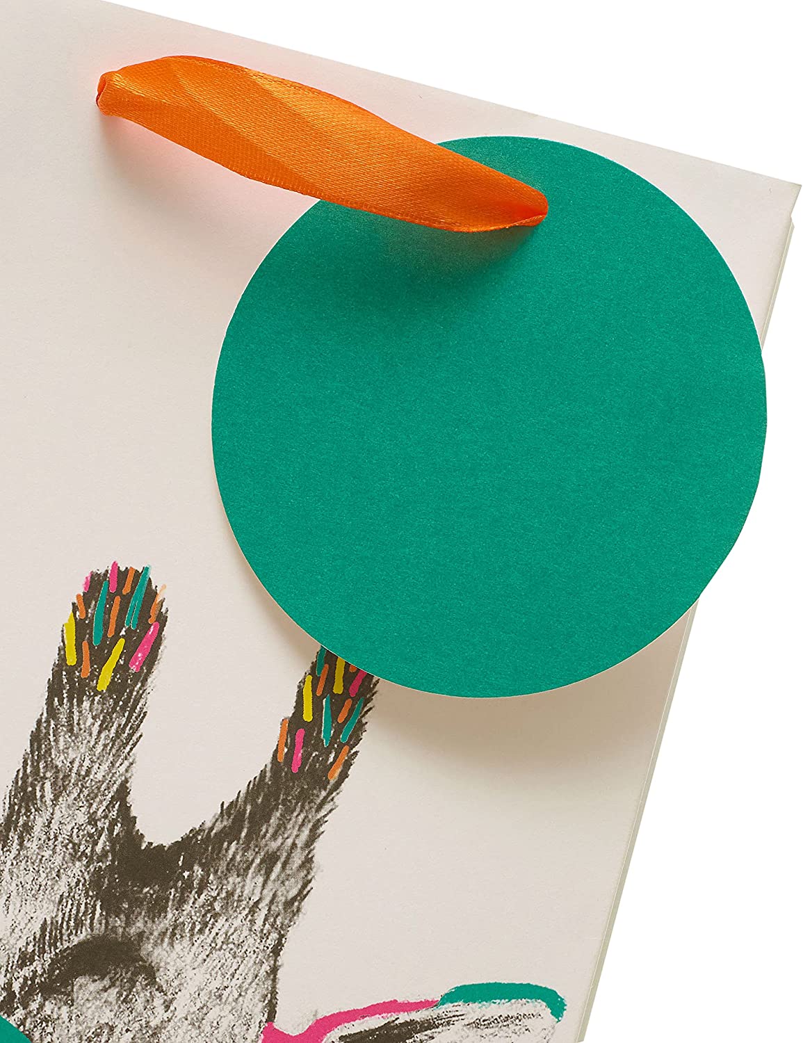 Greeting card featuring a giraffe design, packaged in a gift bag, from UK Greetings with colorful, playful animal artwork.