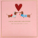 Valentine's Day greeting card featuring a sausage dog couple design with envelope, from UK Greetings.