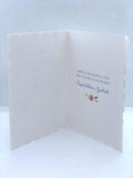 Sparkly glitter diamante girl graduation greeting card from UK Greetings with colorful design and celebratory message.