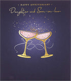 Gold glitter daughter and son-in-law anniversary greeting card from UK Greetings featuring festive design and heartfelt message.