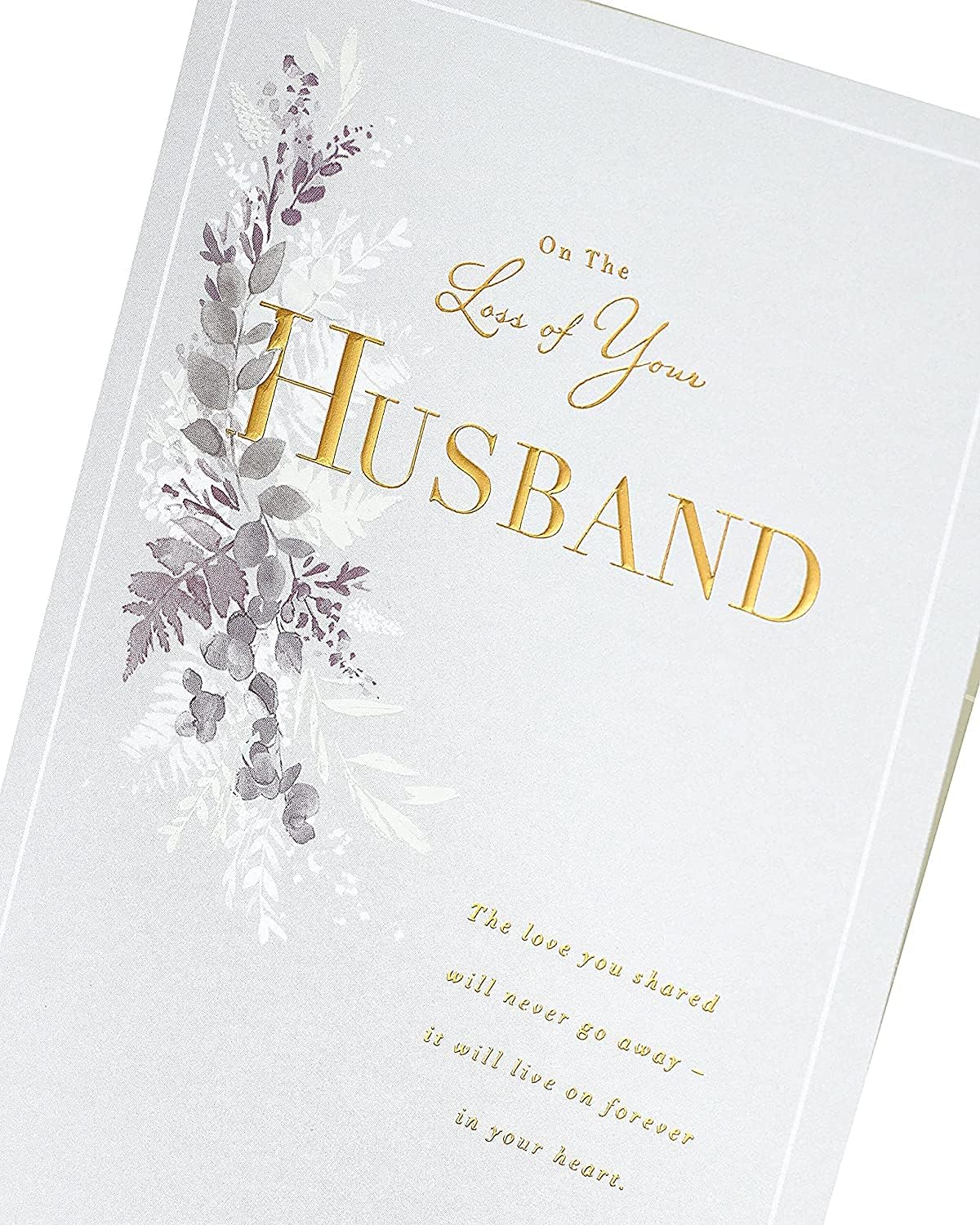 Gold foil husband loss sympathy greeting card from UK Greetings featuring heartfelt design for condolences.