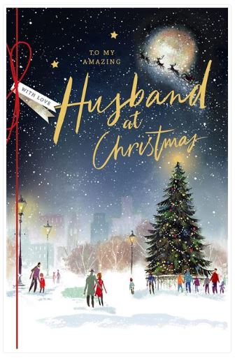 Husband Christmas card featuring a festive city scene with a Christmas tree and loving message, from UK Greetings.