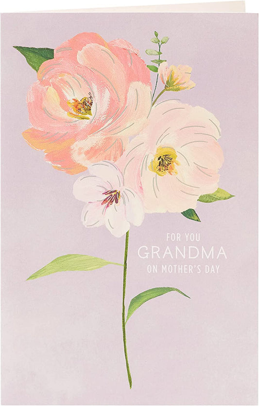 UK Greetings Integrated-Grandma (50) greeting card featuring colorful floral design for special birthday wishes.