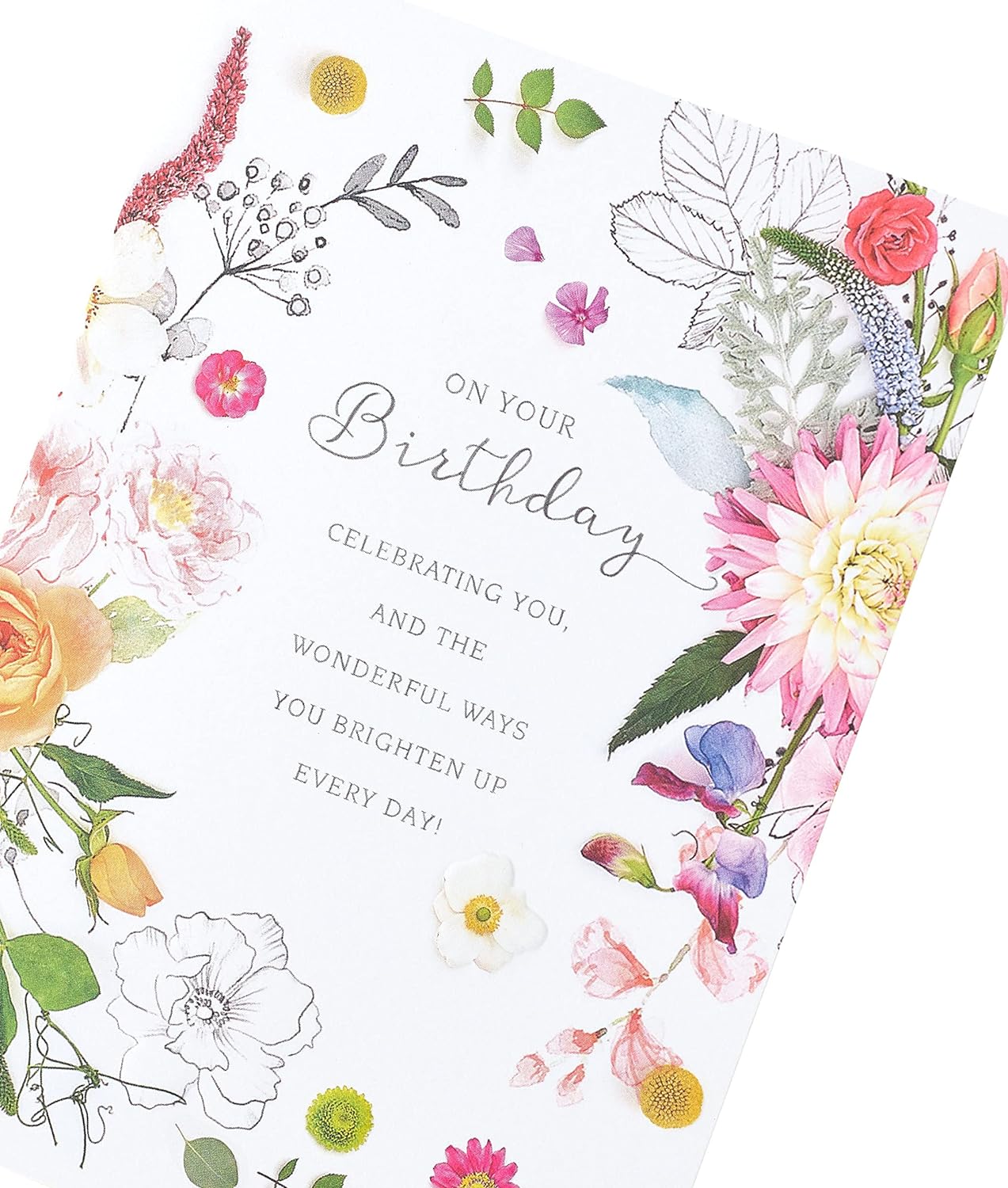 Cute floral birthday greeting card from UK Greetings featuring colorful meadow flowers and cheerful design.