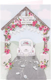 Laser-cut wedding car greeting card with intricate heart and car designs, perfect for wedding celebrations.