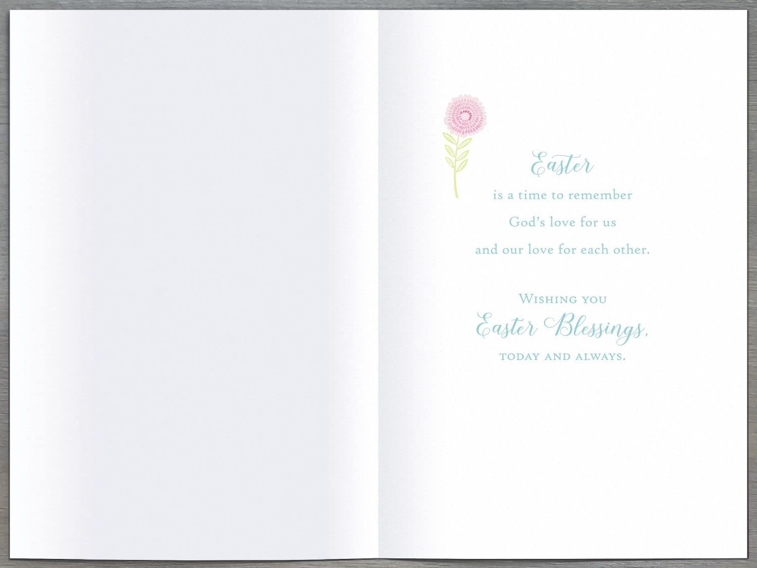 Easter greeting card with a cross and colorful flowers, celebrating the resurrection, from UK Greetings.