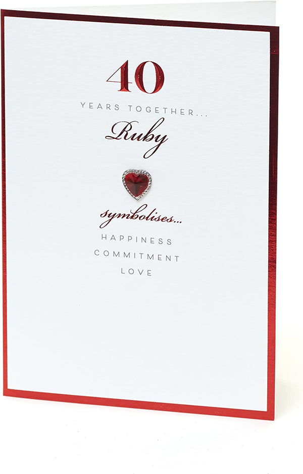 Luxury 40th Ruby Anniversary greeting card with a heart-shaped gem design from UK Greetings, featuring elegant red and gold accents.