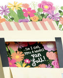 Magical pop-up flower truck greeting card by UK Greetings featuring colorful floral design and cheerful imagery.
