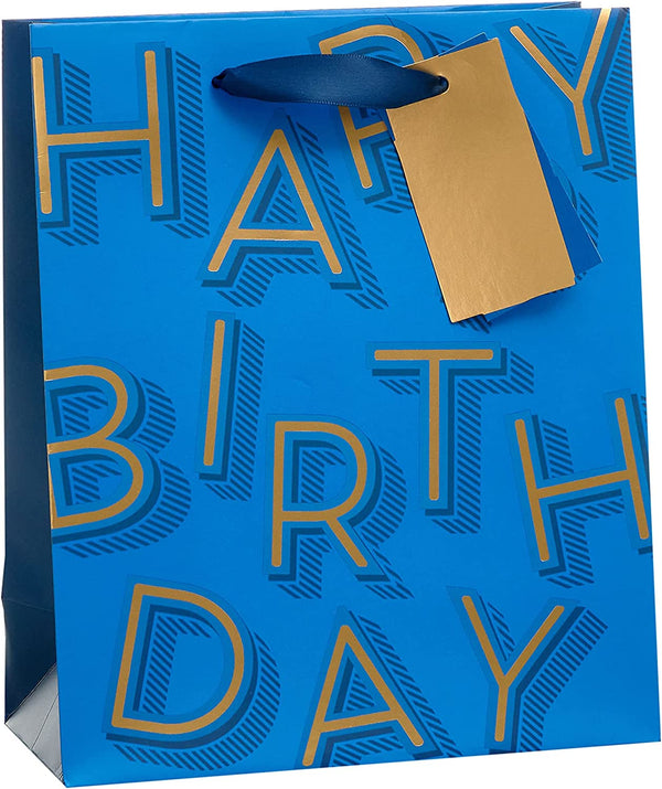 Medium blue UK Greetings gift bag with birthday lettering, featuring decorative design and handles for gift presentation.