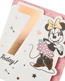 Minnie Mouse 7th birthday greeting card for girls, colorful design featuring Minnie Mouse from UK Greetings.