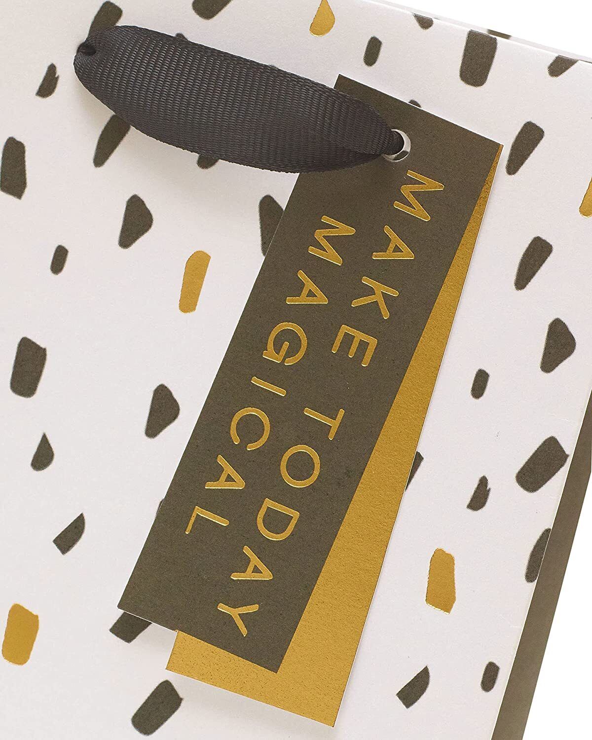 Elegant greeting card from UK Greetings with a modern design, featuring stylish patterns and a sophisticated appearance.