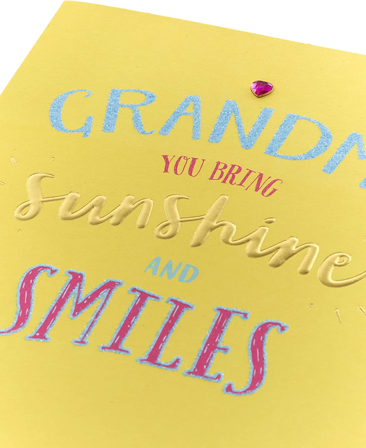 Mother's Day greeting card from UK Greetings featuring a cheerful design with sunshine and smiling grandma illustration.