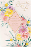 Beautiful floral design Mother's Day greeting card with envelope from UK Greetings, featuring vibrant blossoms and elegant details.