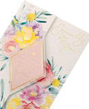 Beautiful floral design Mother's Day greeting card with envelope by UK Greetings, featuring colorful flowers and elegant messaging.
