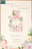 Mother's Day greeting card with pretty perfume design and white envelope, UK Greetings floral-themed card for special occasions.