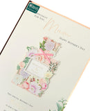White Mother's Day greeting card with perfume design and envelope, UK Greetings, featuring elegant floral and perfume illustrations.