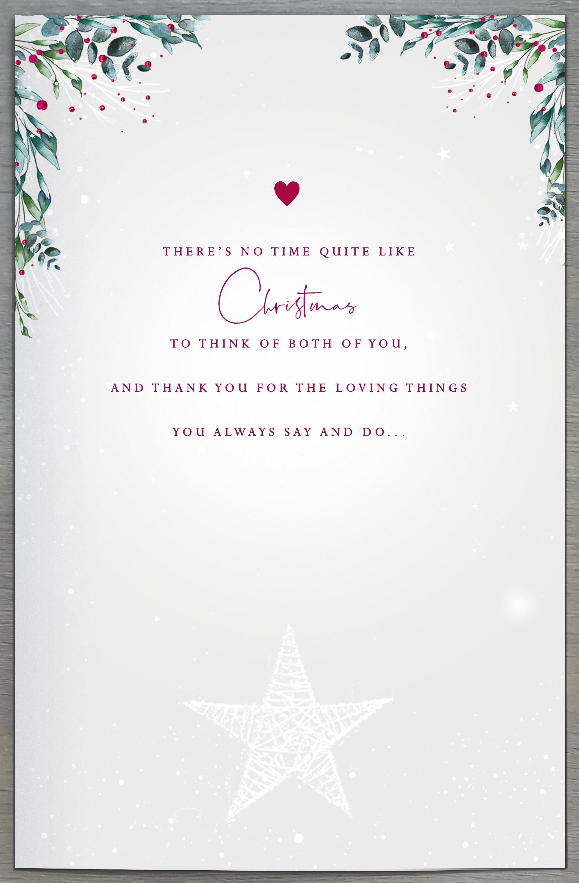 UK Greetings Mum and Dad fireplace Christmas greeting card featuring festive holiday design and warm holiday message.