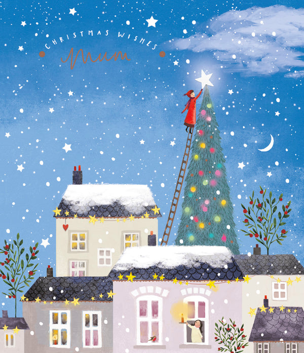 UK Greetings Mum Christmas card featuring a festive tree and houses design with holiday-themed artwork.