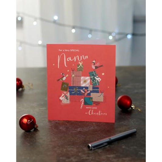 Nanna’s Magical Christmas greeting card featuring presents and gold wishes from UK Greetings, with festive holiday illustrations.