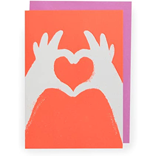 Neon heart hands birthday greeting card by UK Greetings featuring vibrant pink and blue neon hand designs.