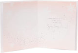 Niece Christmas greeting card featuring a charming chocolate girl design with foiled accents, by UK Greetings.