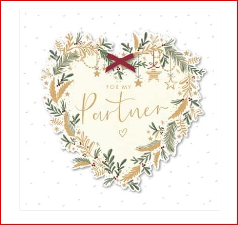 Decorative Christmas greeting card with a heart design from UK Greetings, featuring festive holiday artwork.