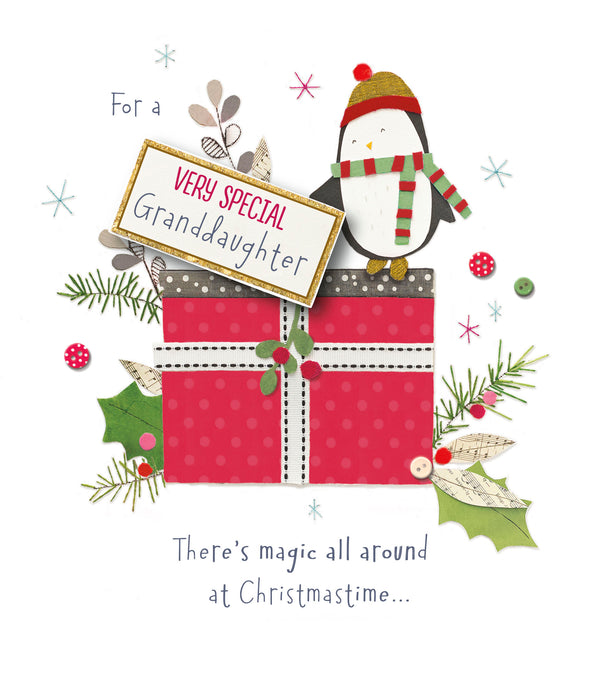 Penguin and present Christmas greeting card for granddaughter featuring festive holiday design by UK Greetings.
