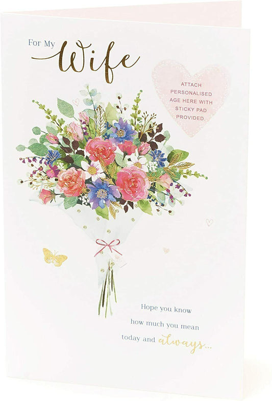 Personalized wife milestone birthday greeting card from UK Greetings featuring elegant floral design and customized message.